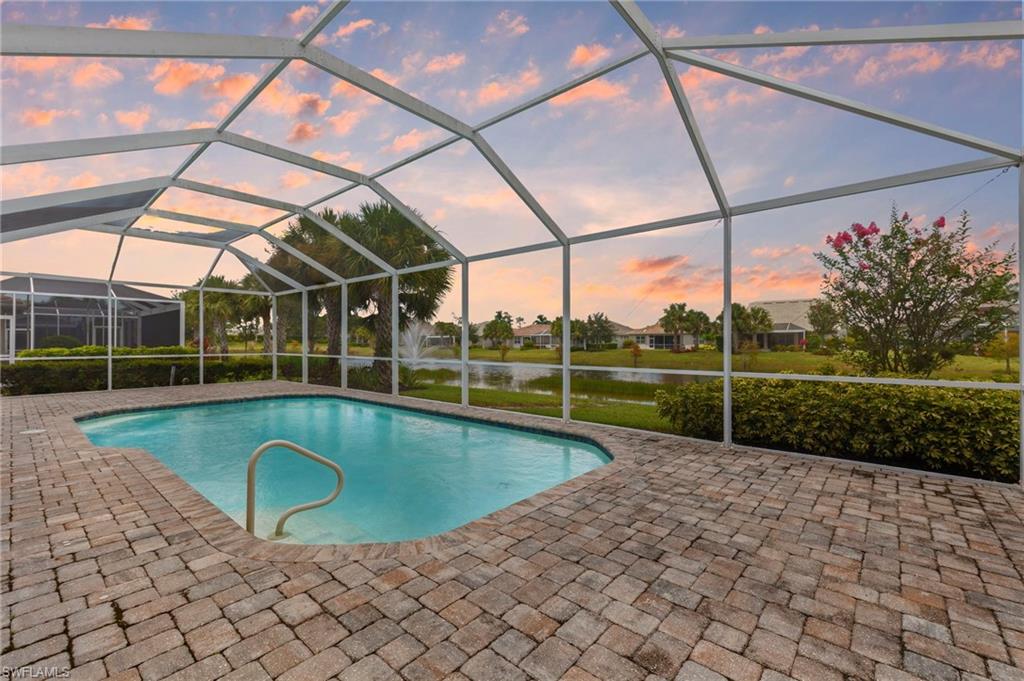 10530 Jackson Square Drive Estero, FL 33928 - Photo 35 of 48 a view of a swimming pool with a backyard