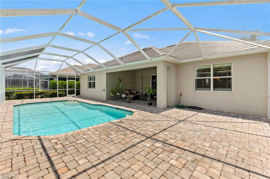 10530 Jackson Square Drive Estero, FL 33928 - Photo 37 of 48 a view of a backyard of the house