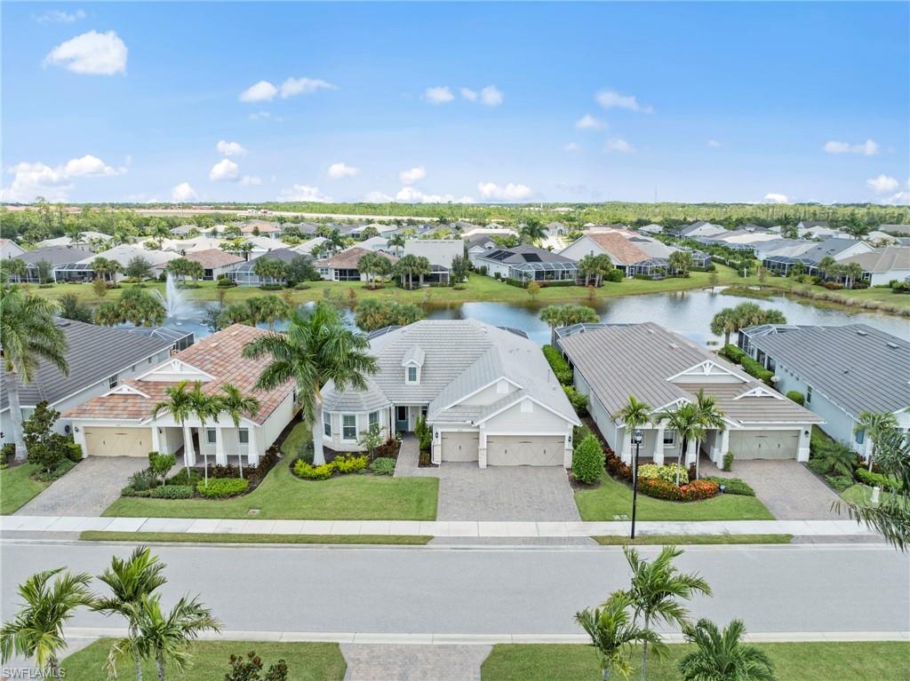 10530 Jackson Square Drive Estero, FL 33928 - Photo 39 of 48 an aerial view of a house with a garden and plants