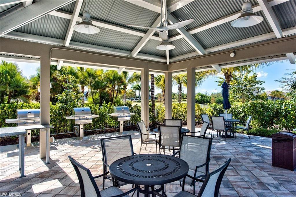 10530 Jackson Square Drive Estero, FL 33928 - Photo 46 of 48 a view of a patio filled with furniture