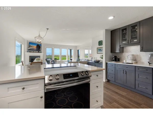a kitchen with a sink and a stove