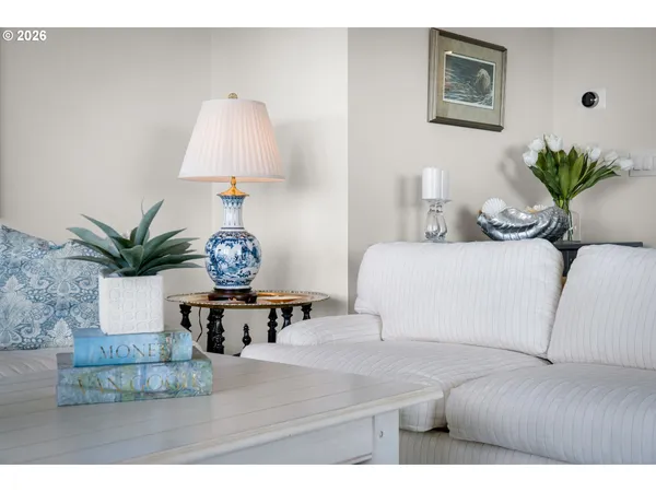 a bedroom with a bed and a lamp