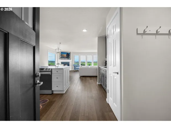 a kitchen with a stove a refrigerator and a sink