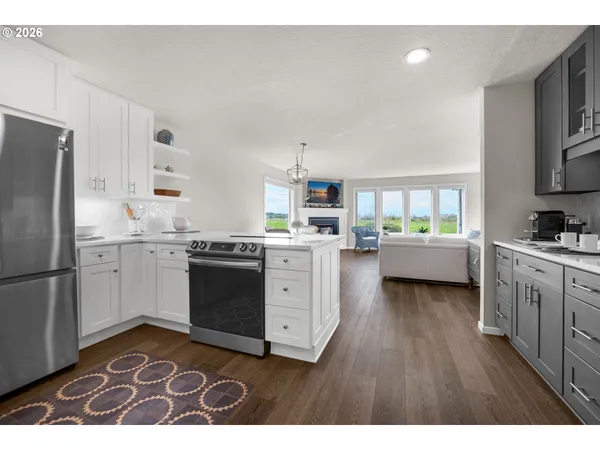 a kitchen with a stove and a sink