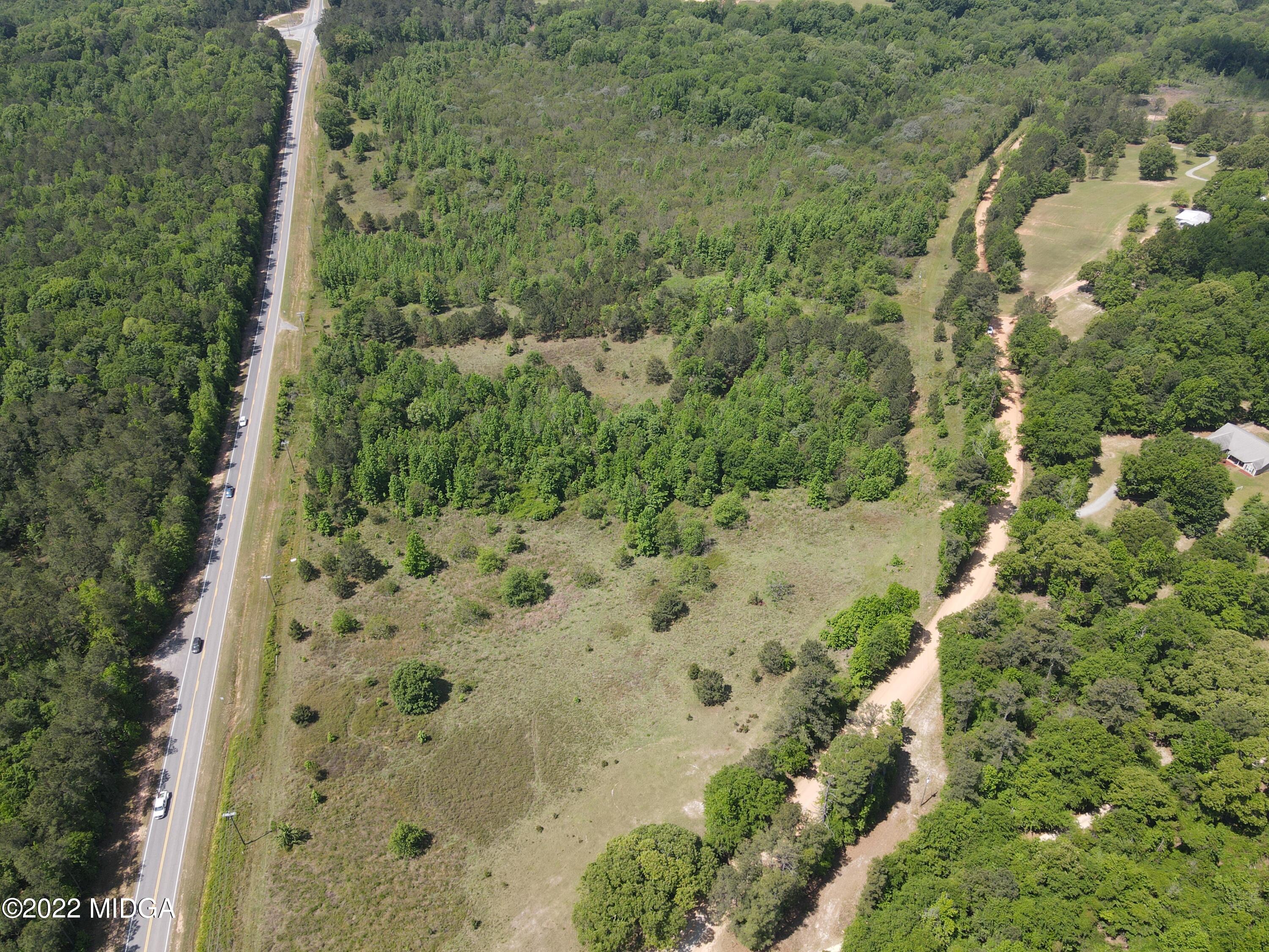 0 Genie Ethridge Road Gray, GA 31032 - Photo 4 of 14 a view of a forest with a house