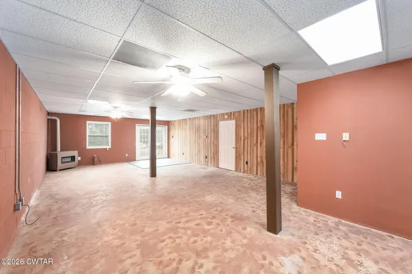 a view of empty room with windows