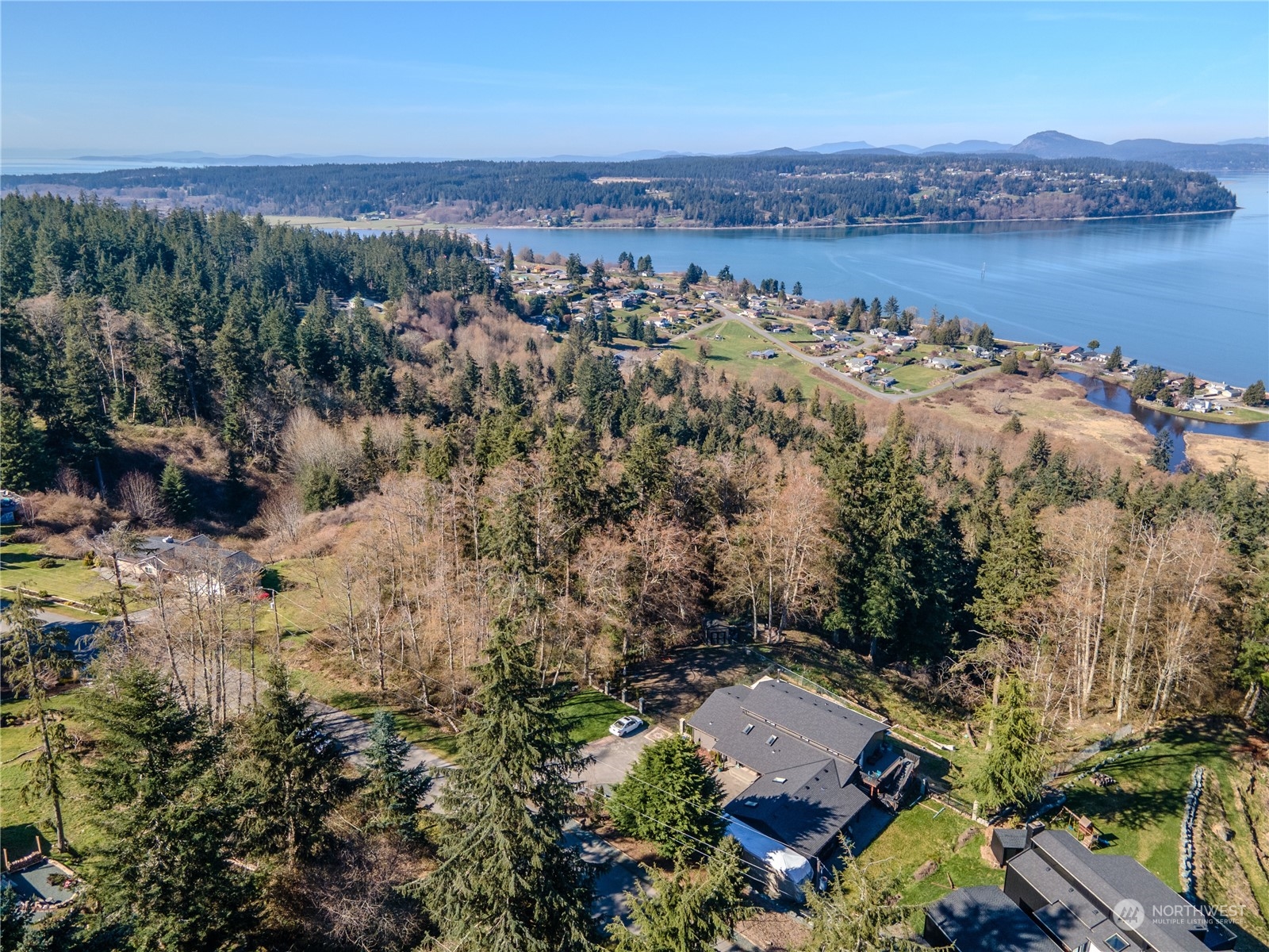 0 Greenoch Loop Oak Harbor, WA 98277 - Photo 28 of 34 an aerial view of a house with a lake view