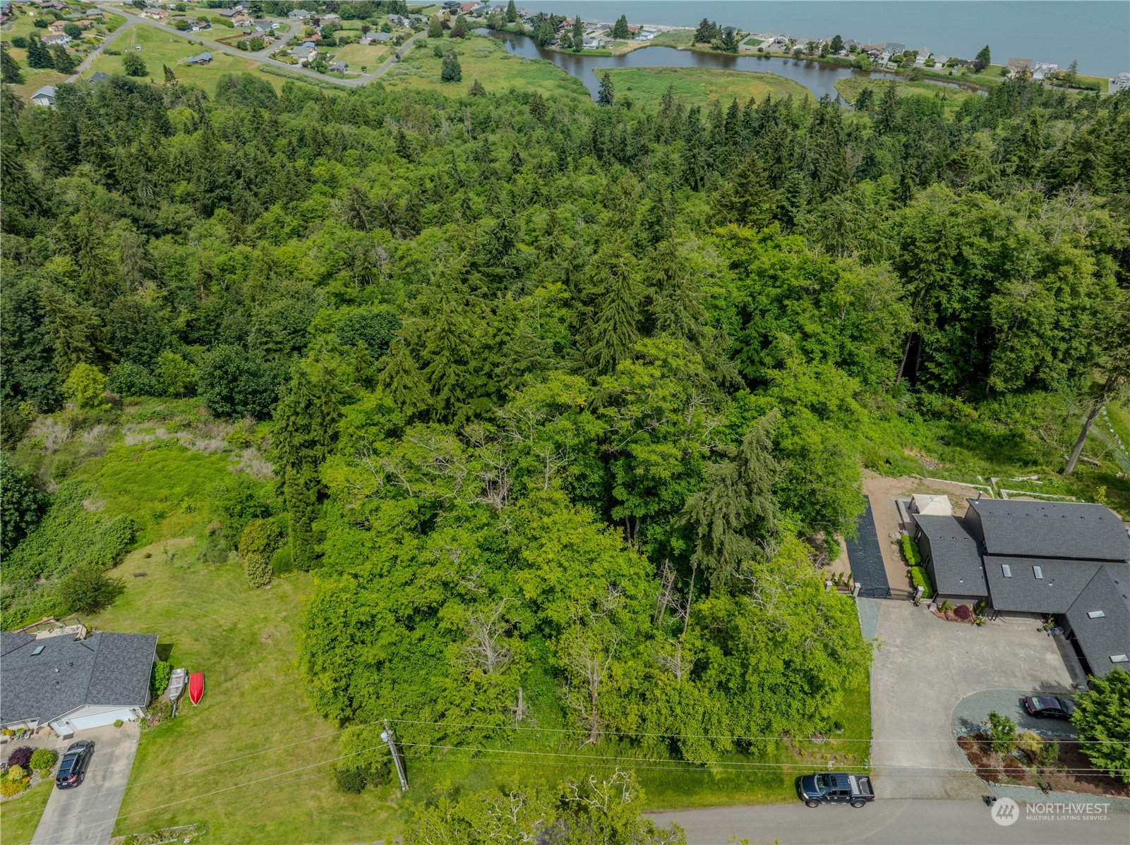 0 Greenoch Loop Oak Harbor, WA 98277 - Photo 3 of 34 an aerial view of a house with a yard