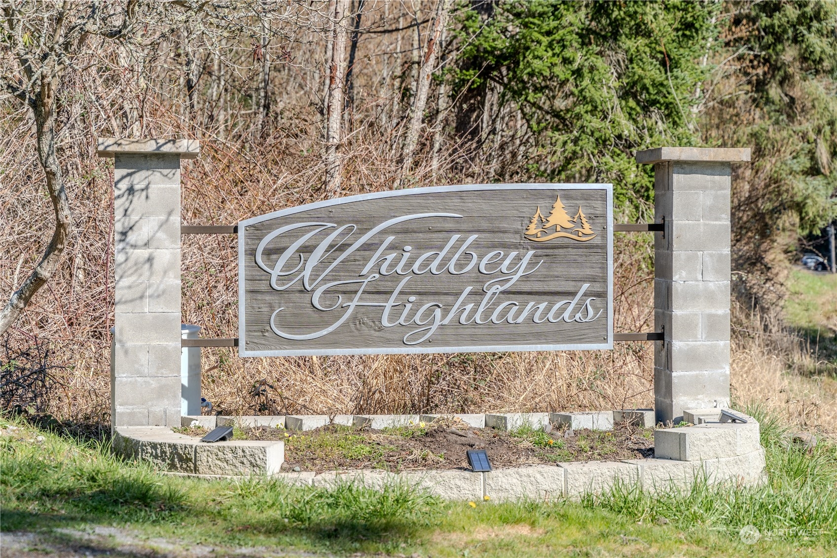 0 Greenoch Loop Oak Harbor, WA 98277 - Photo 33 of 34 a sign that is on the side of a building