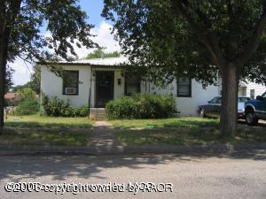 106 Southwest 36th Avenue Amarillo, TX 79110 - Photo 1 of 1 a view of a house with yard and a garden