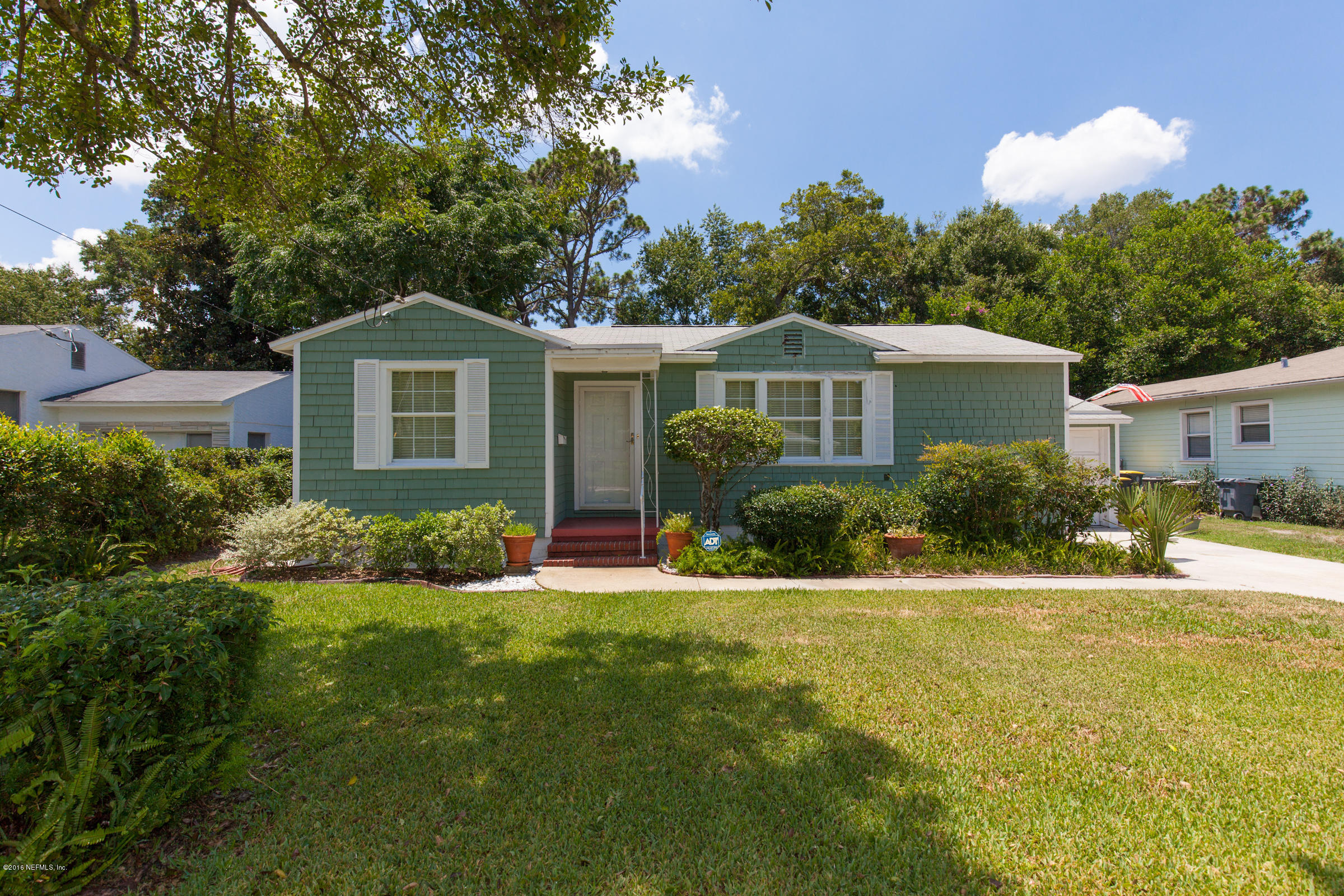 5432 Duke Road Jacksonville, FL 32207 - Photo 1 of 18 a front view of a house with a yard