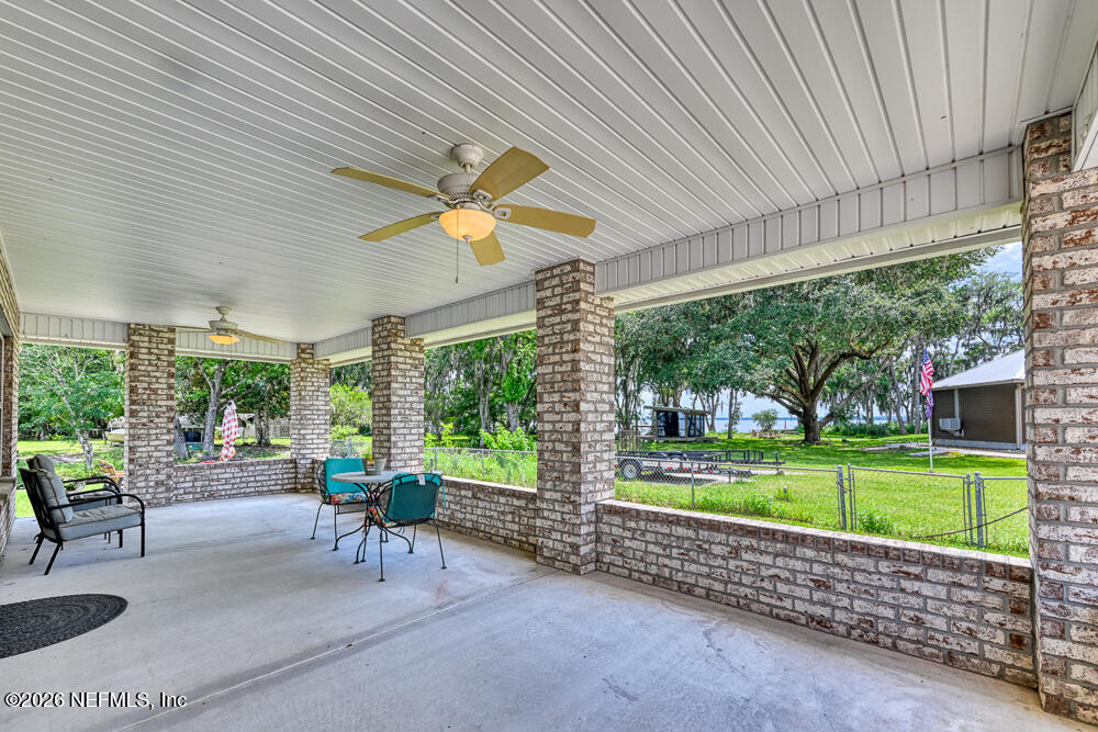 7837 Rusty Anchor Road St. Augustine, FL 32092 - Photo 3 of 41 Side porch