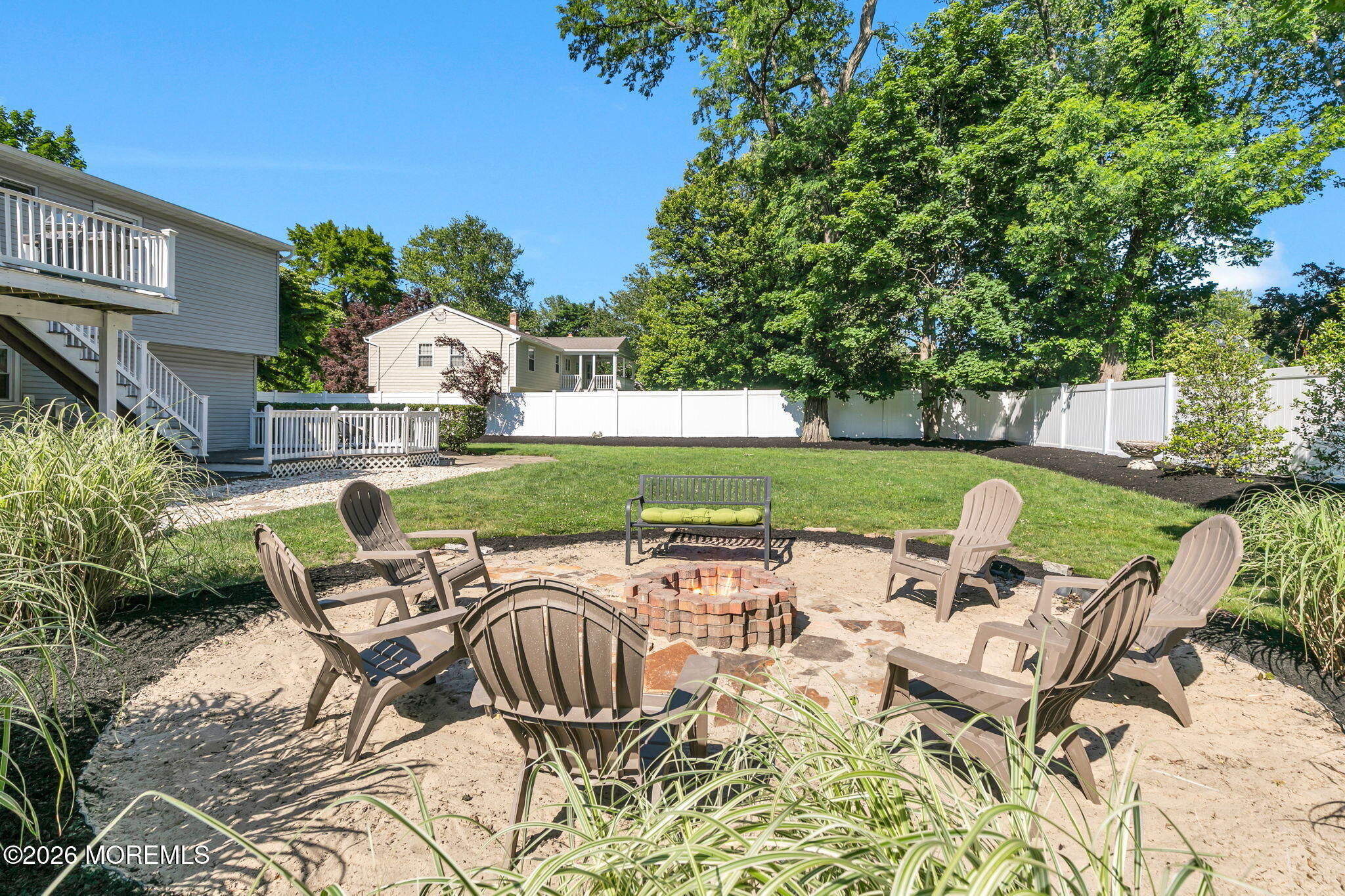 53 Field Avenue Red Bank, NJ 07701 - Photo 29 of 39 a view of a patio with table and chairs and potted plants with large tree