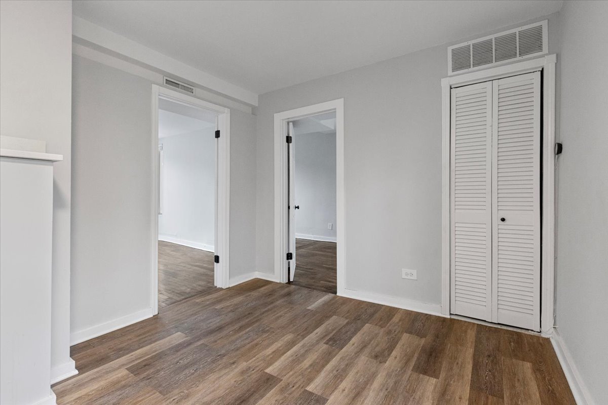 1849 West Augusta Boulevard, Unit 3 Chicago, IL 60622 - Photo 10 of 11 wooden floor in an empty room