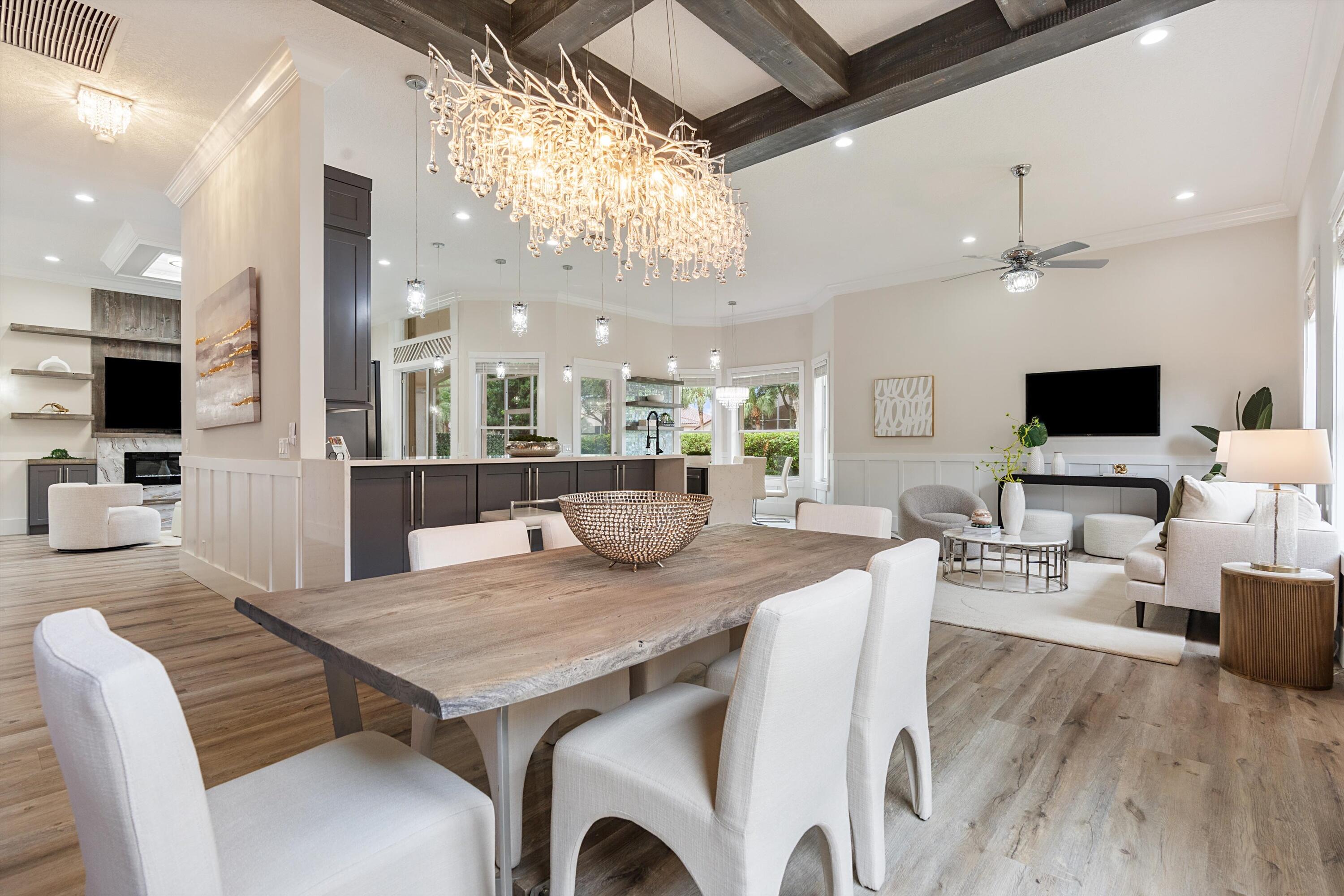 6661 Garde Road Boynton Beach, FL 33472 - Photo 13 of 48 a view of a dining room with furniture