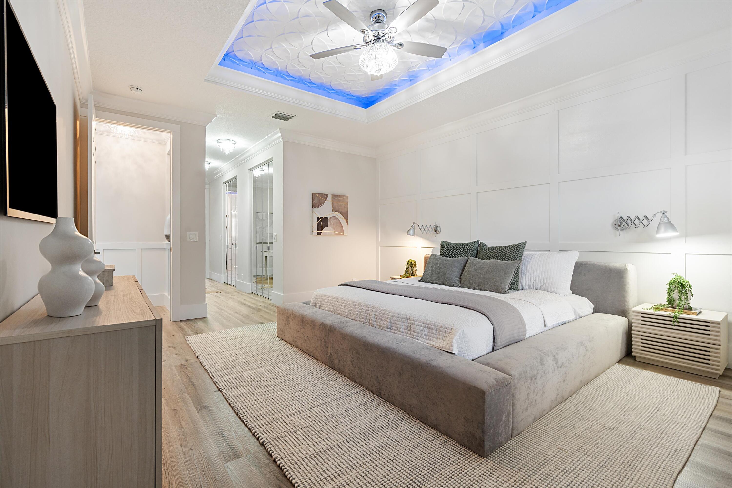 6661 Garde Road Boynton Beach, FL 33472 - Photo 17 of 48 a living room with furniture and a chandelier