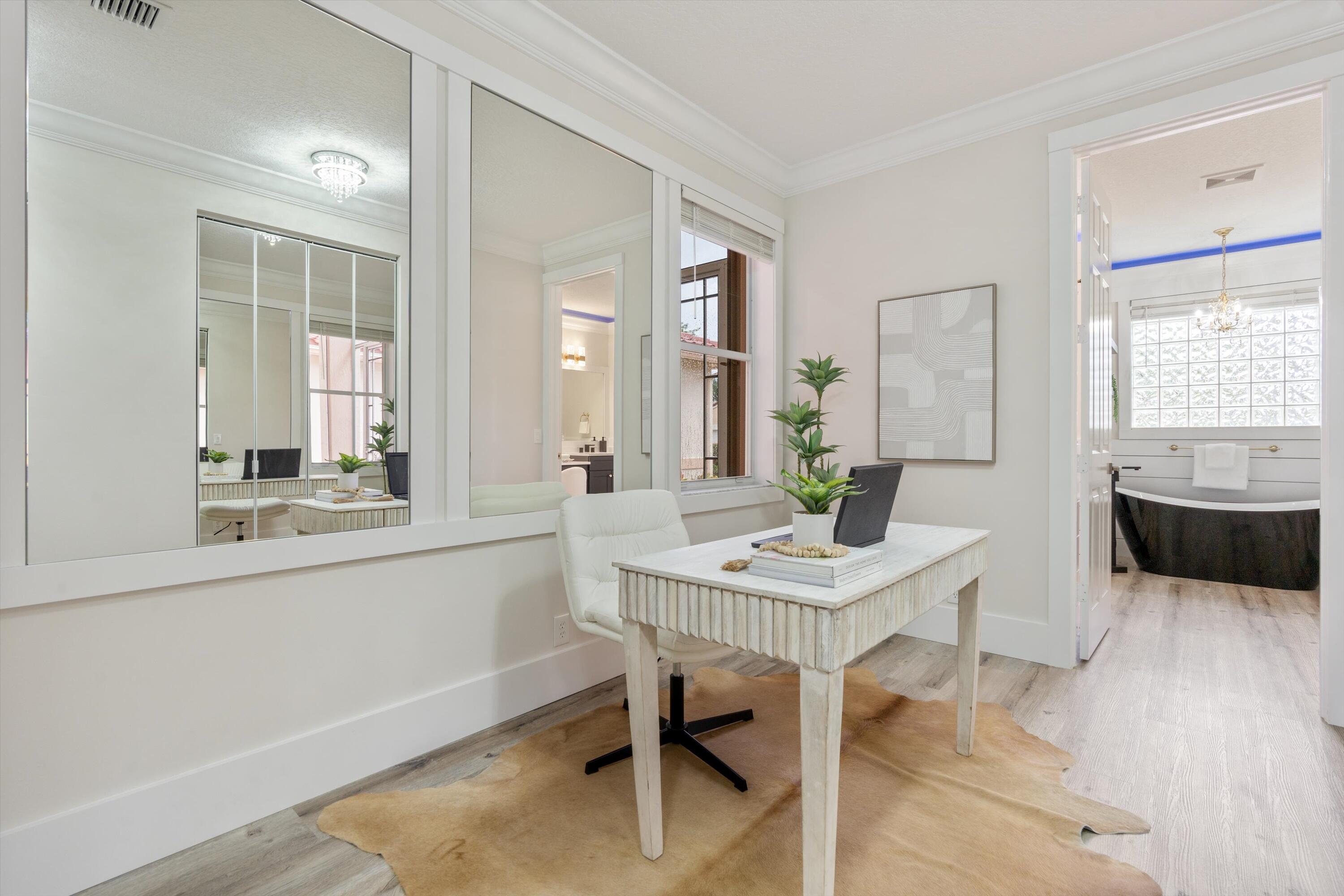 6661 Garde Road Boynton Beach, FL 33472 - Photo 20 of 48 a kitchen with a table and chairs in it
