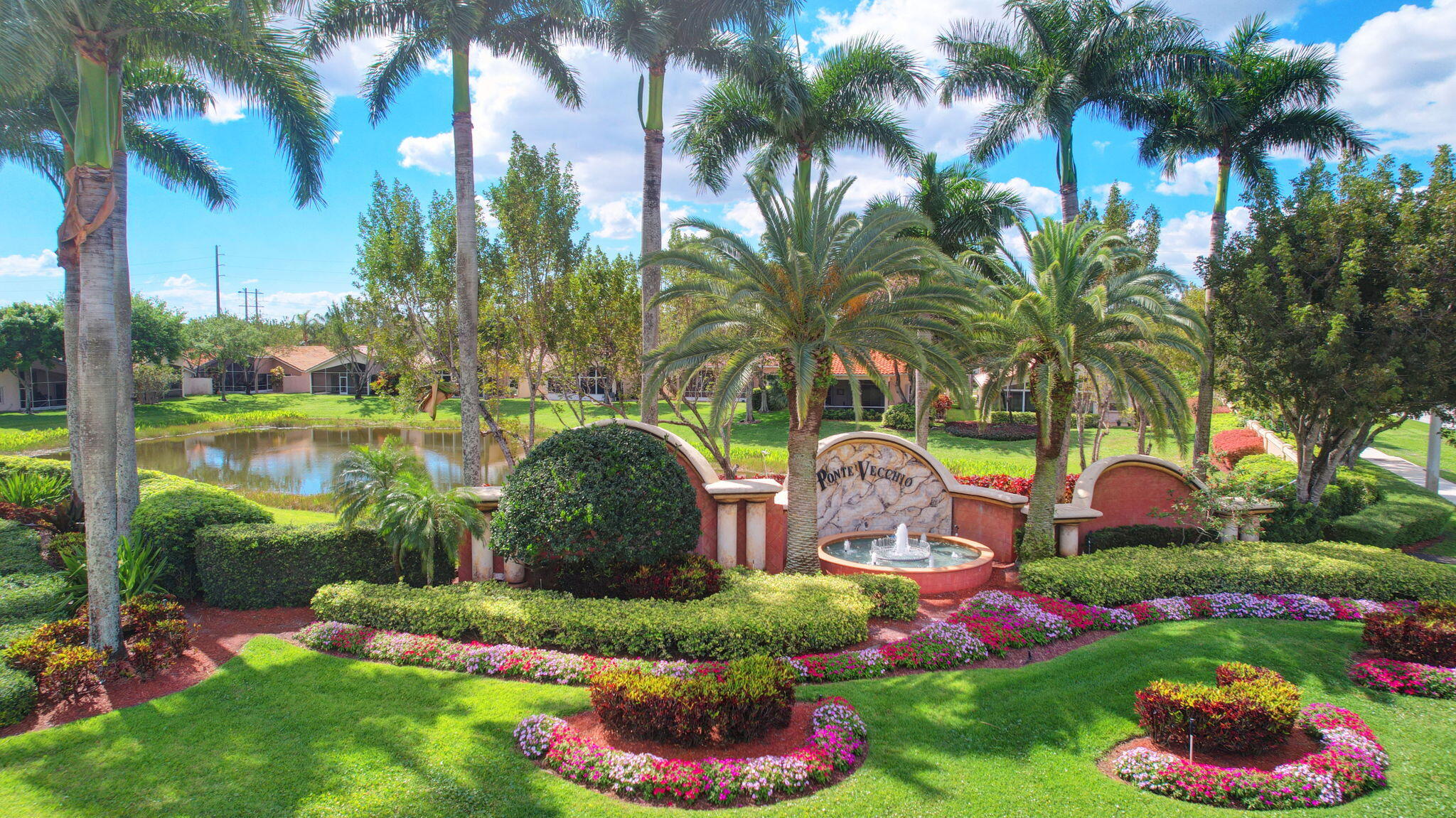 6661 Garde Road Boynton Beach, FL 33472 - Photo 33 of 48 a view of a table and chairs in patio next to a yard