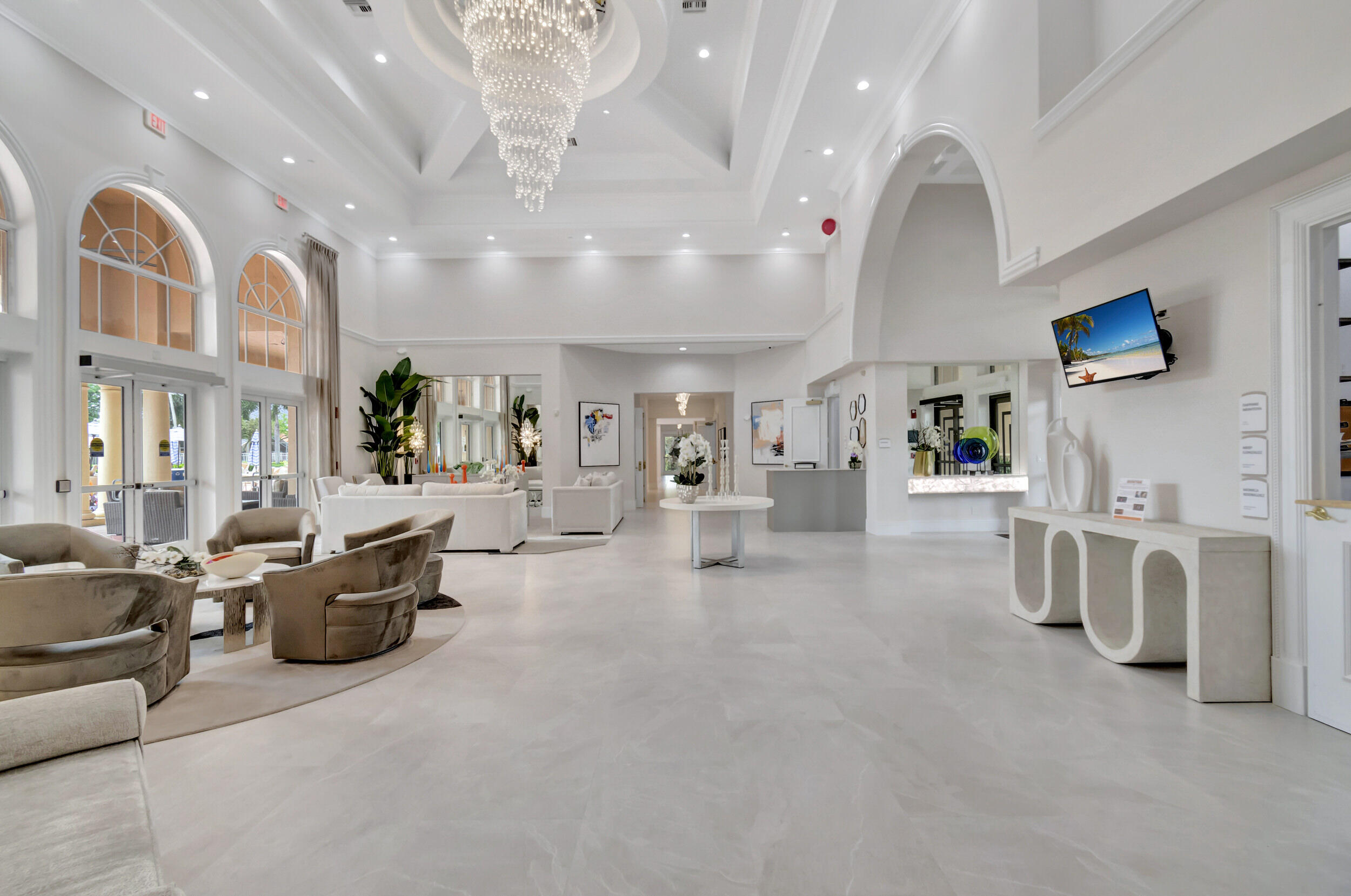 6661 Garde Road Boynton Beach, FL 33472 - Photo 35 of 48 a living room with furniture and a chandelier