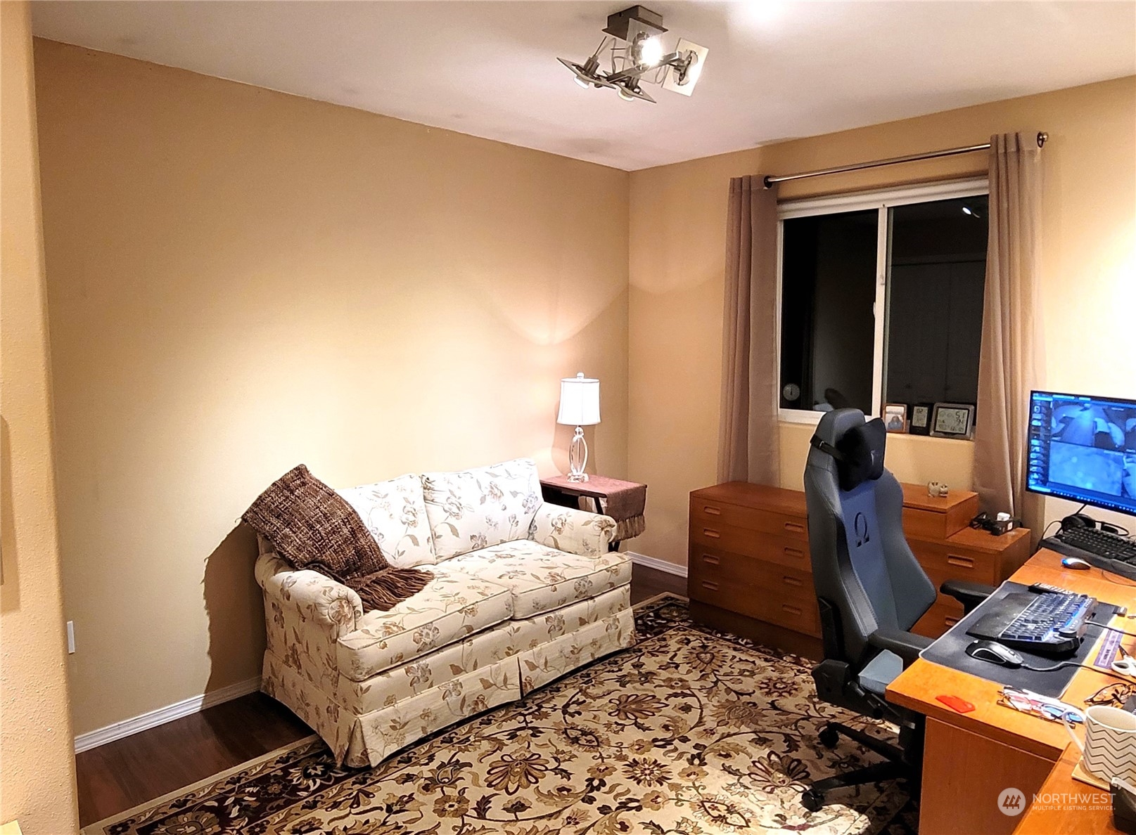 590 East Bush Point Road Freeland, WA 98249 - Photo 19 of 25 a living room with furniture and a window