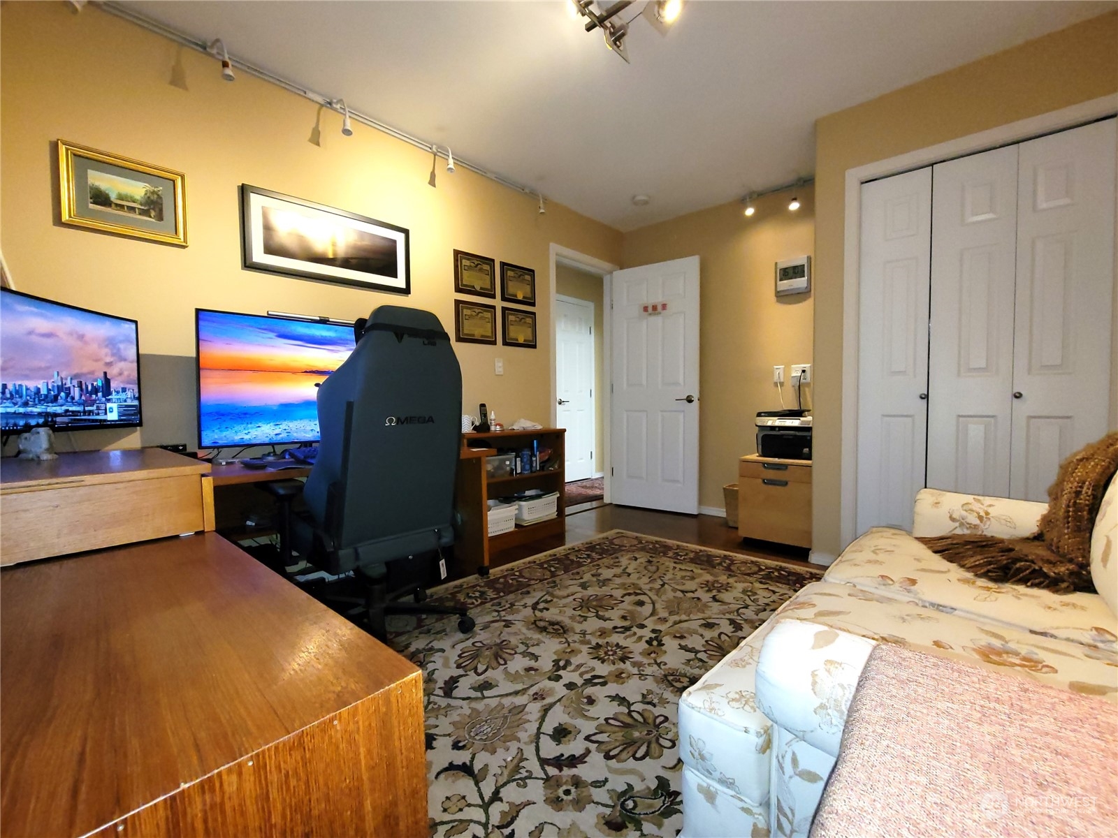 590 East Bush Point Road Freeland, WA 98249 - Photo 20 of 25 a bedroom with a bed and furniture