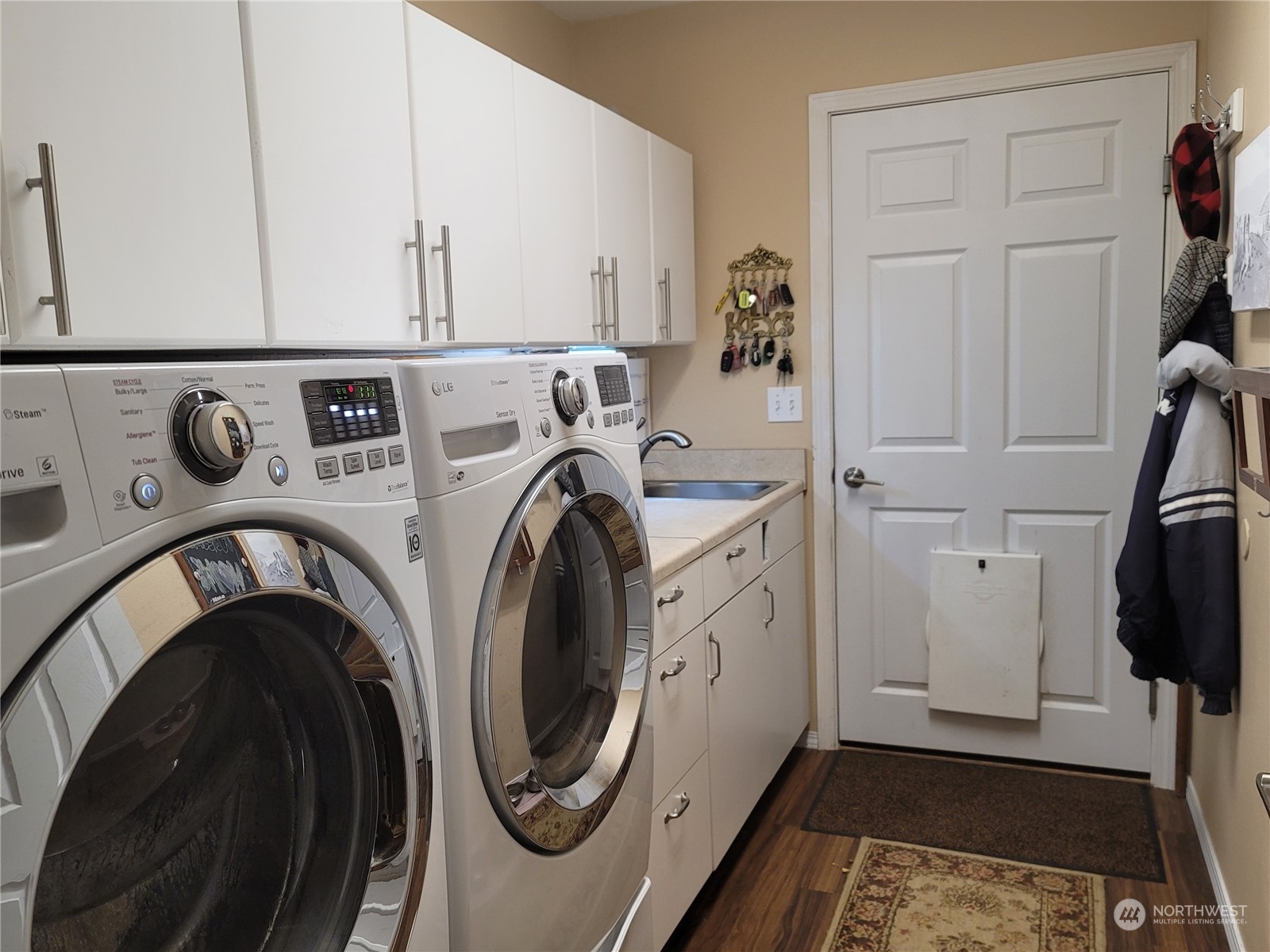 590 East Bush Point Road Freeland, WA 98249 - Photo 22 of 25 a utility room with dryer and washer