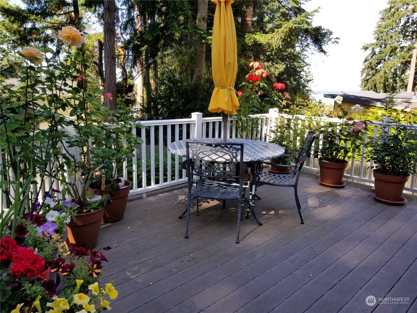 590 East Bush Point Road Freeland, WA 98249 - Photo 23 of 25 a view of a chairs and table in the patio