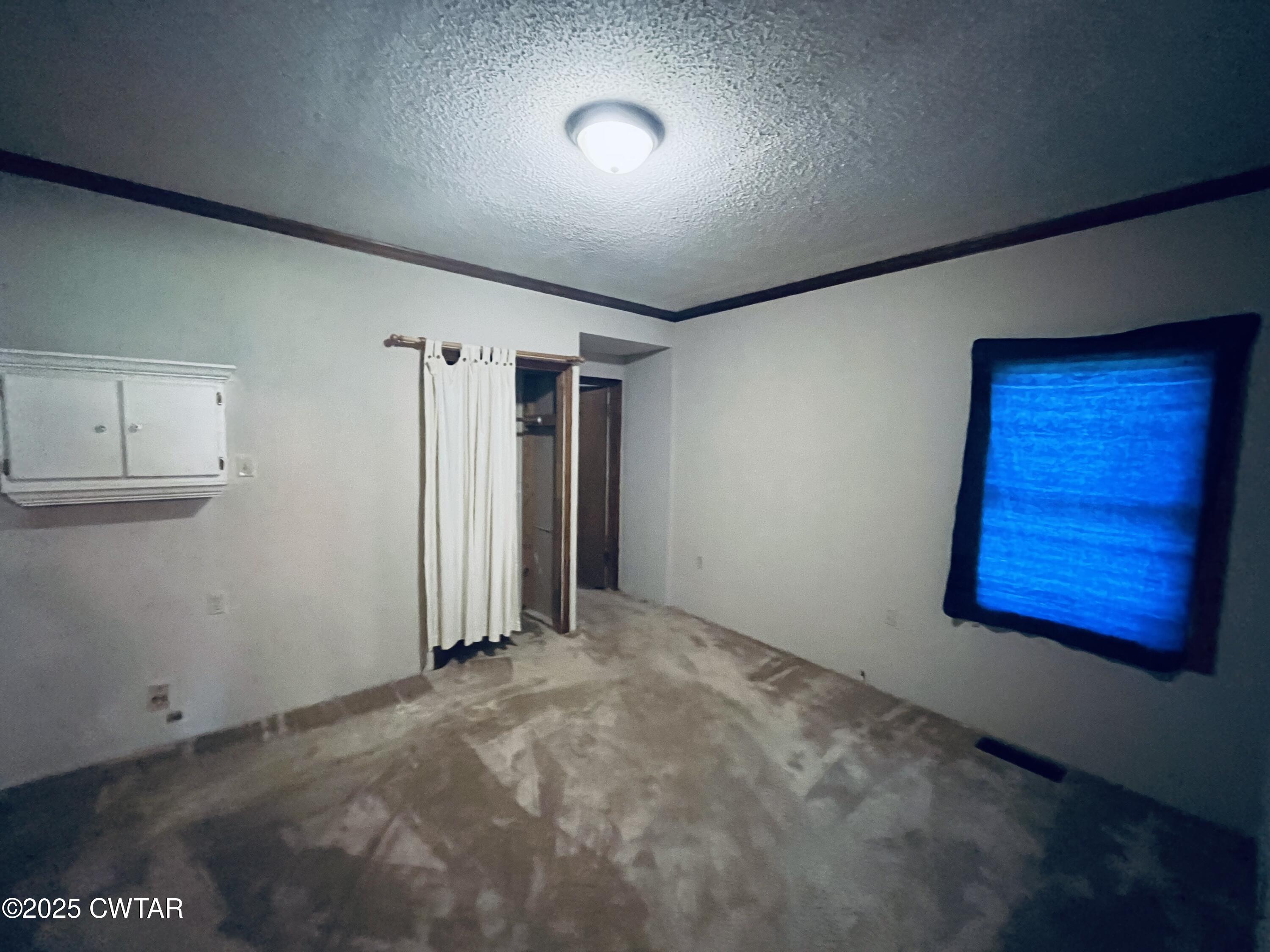 294 Ridgeway Road Sugar Tree, TN 38380 - Photo 16 of 34 an empty room with windows