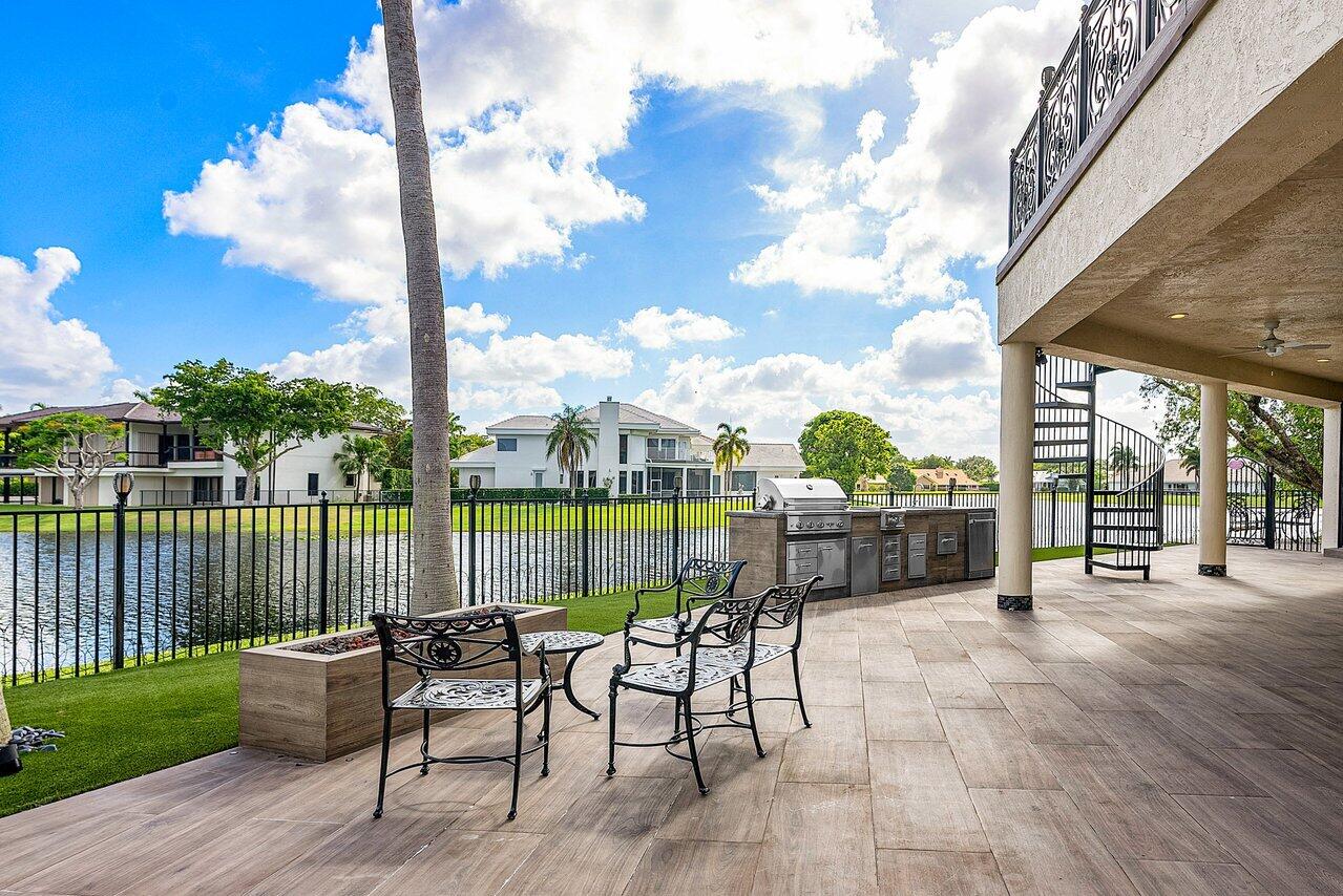 4845 Regency Court Boca Raton, FL 33434 - Photo 42 of 112 Summer kitchen + Lake views