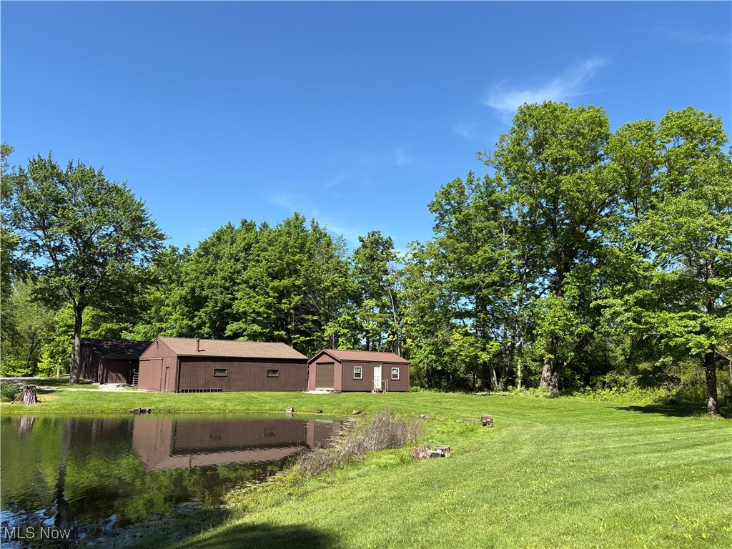 4010 State Road Medina, OH 44256 - Photo 38 of 50 View of green lawn featuring an outdoor structure