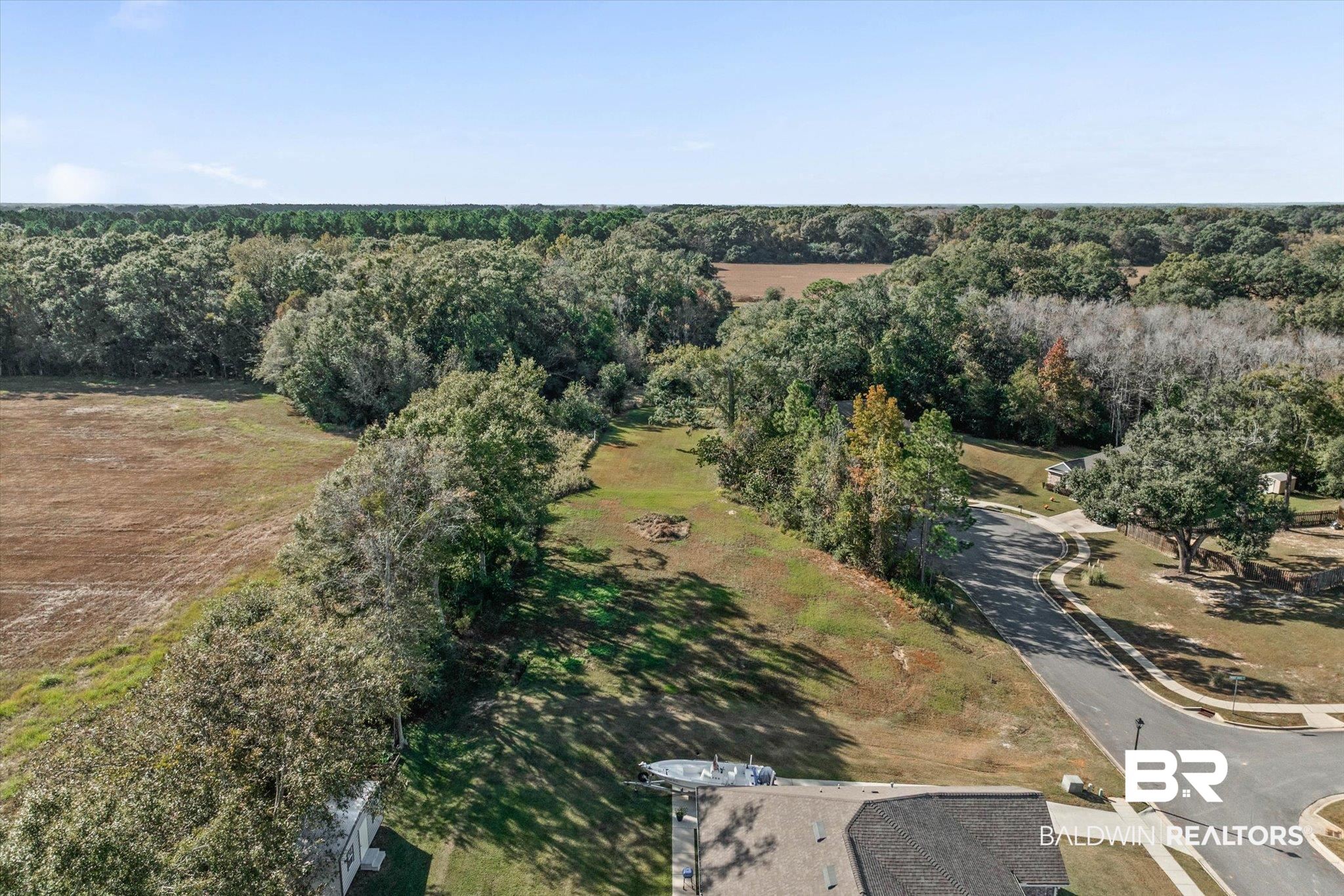 0 Acorn Way Grand Bay, AL 36541 - Photo 5 of 17 Aerial overview of property's location with a forest