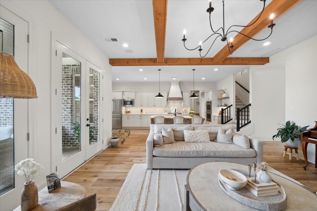 220 Mary Taylor Way Piperton, TN 38017 - Photo 12 of 40 a living room with furniture and a wooden floor