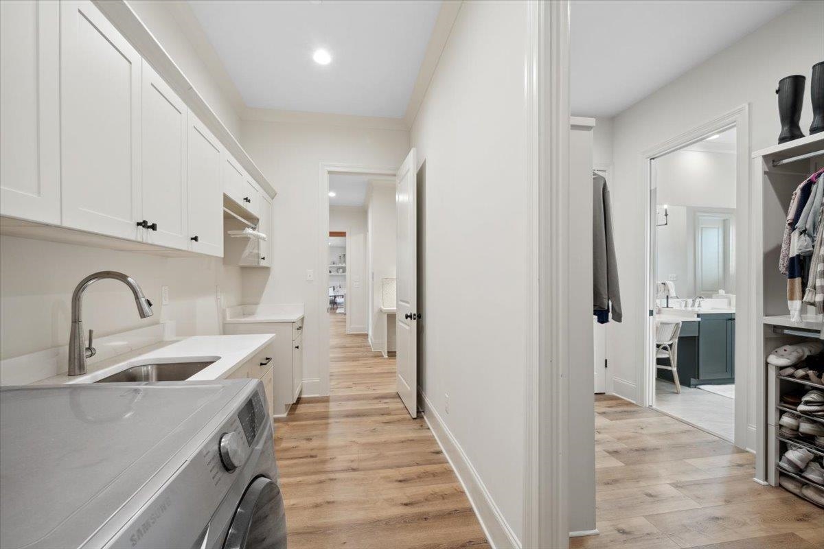 220 Mary Taylor Way Piperton, TN 38017 - Photo 27 of 40 a view of a kitchen with a sink and refrigerator
