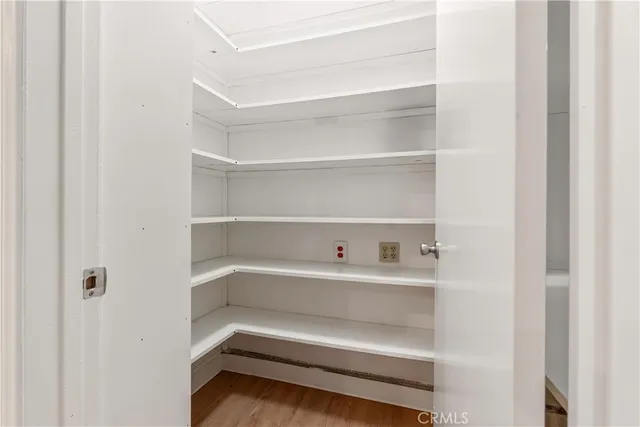 a storage room with washer and dryer