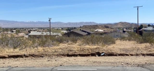 14112 Rancherias Road Apple Valley, CA 92308 - Photo 1 of 1 a view of a lake with a mountain