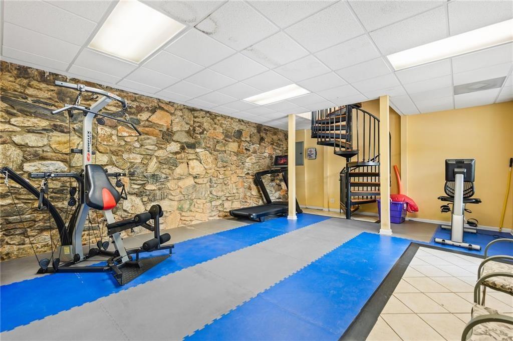 2825 Northeast Expressway, Unit L4 Atlanta, GA 30345 - Photo 32 of 36 a view of a room with gym equipment
