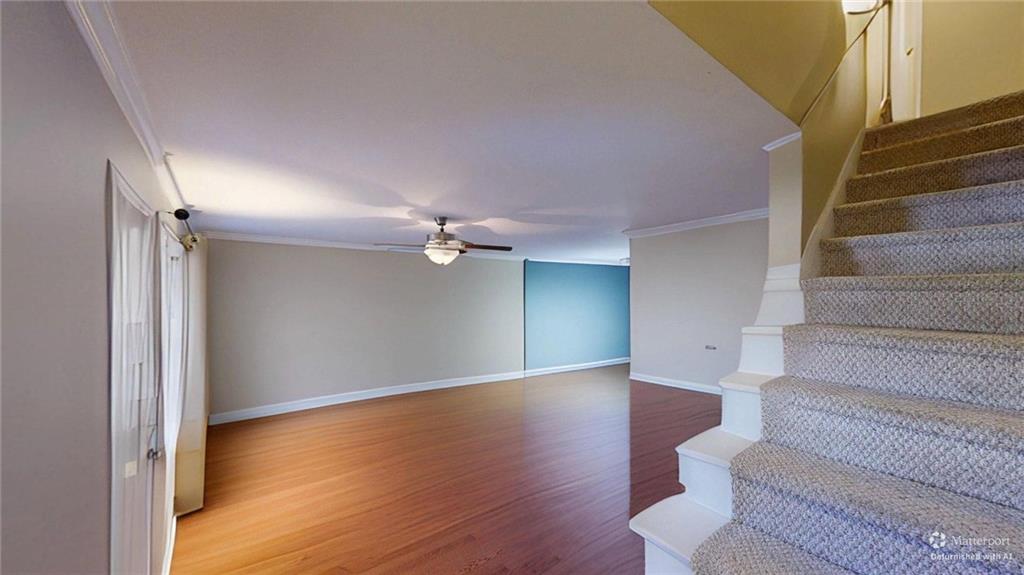 2825 Northeast Expressway, Unit L4 Atlanta, GA 30345 - Photo 10 of 36 a view of an empty room with wooden floor and a window