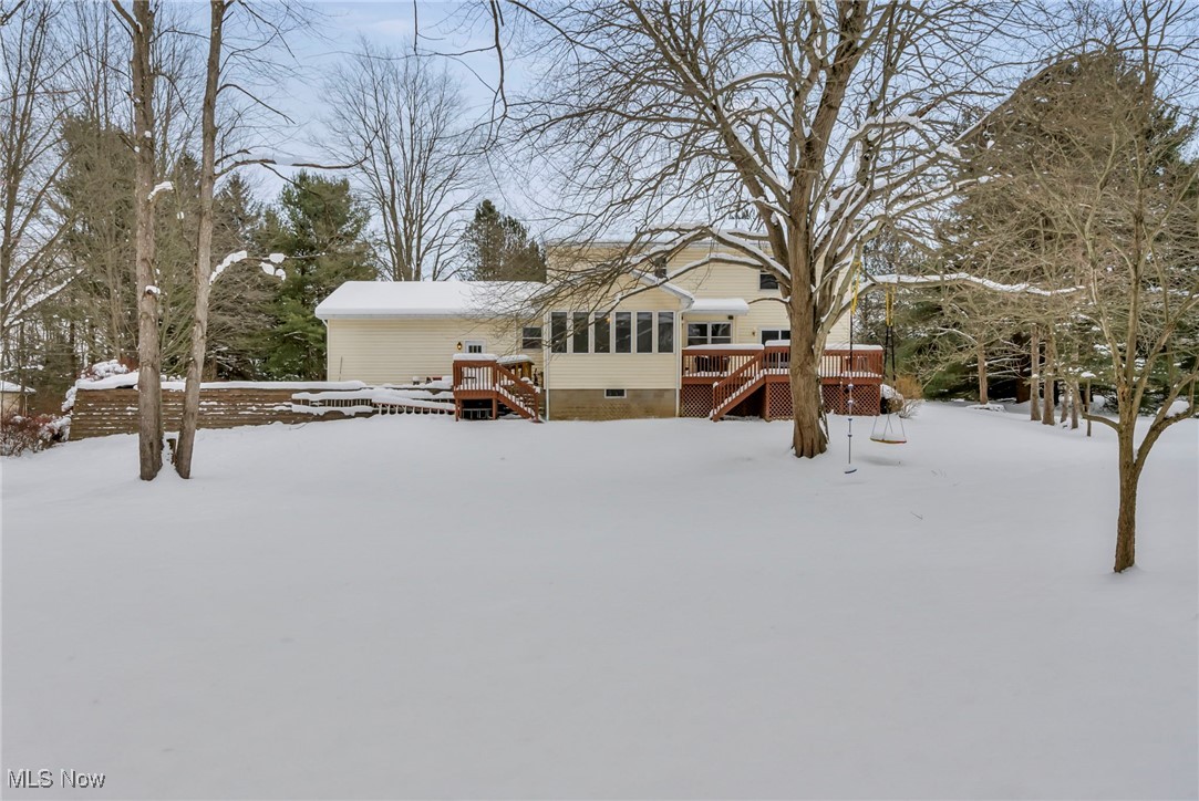 167 Spell Road Kent, OH 44240 - Photo 46 of 48 Snow covered property featuring a deck