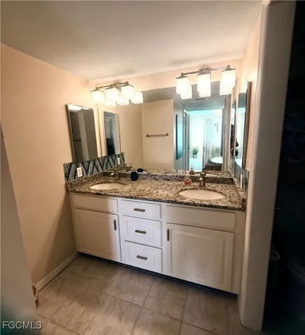 a bathroom with a toilet and a bathtub