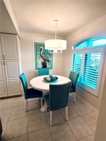 a view of a big yard with a ocean view