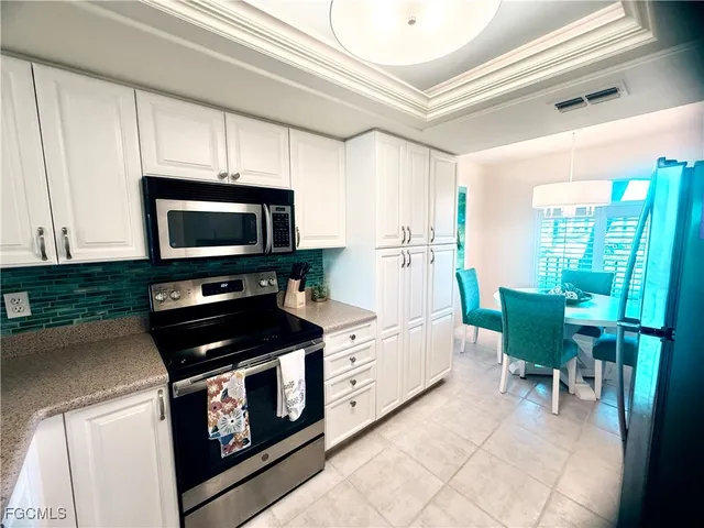 a living room with furniture and a couch