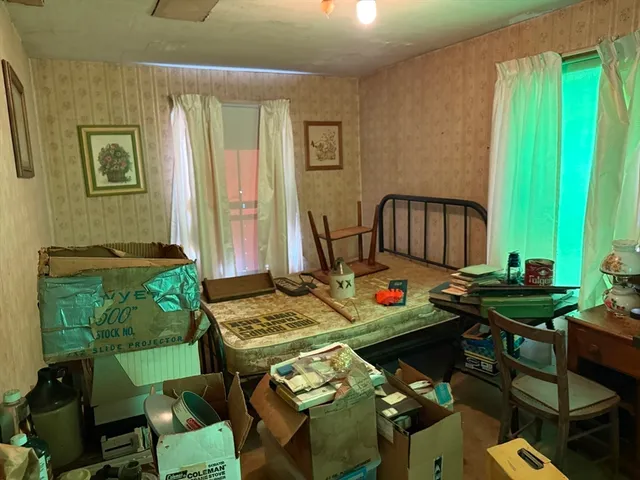 a room with furniture and a window