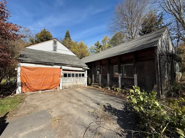 view of a wooden floor in front of a house