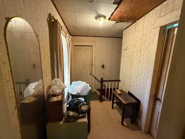 a view of a hallway with workspace