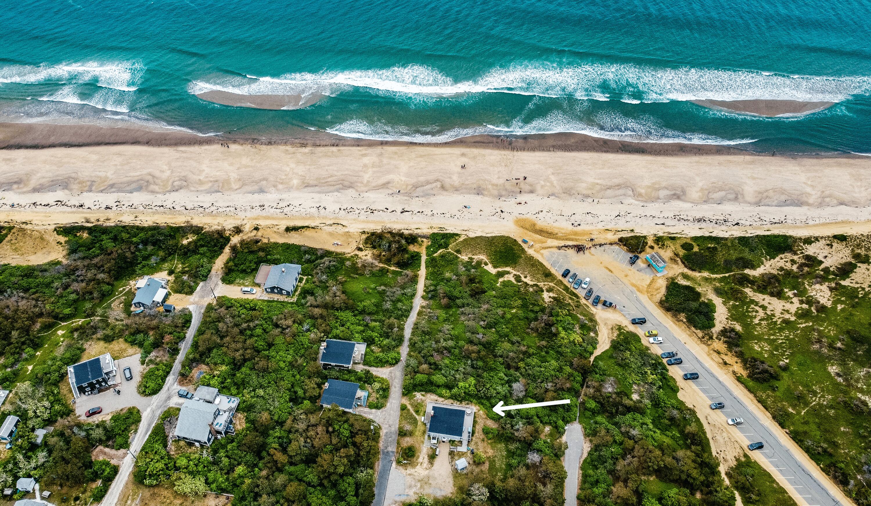 440 Nellie Road Wellfleet, MA 02667 - Photo 1 of 22 a view of a yard with an ocean