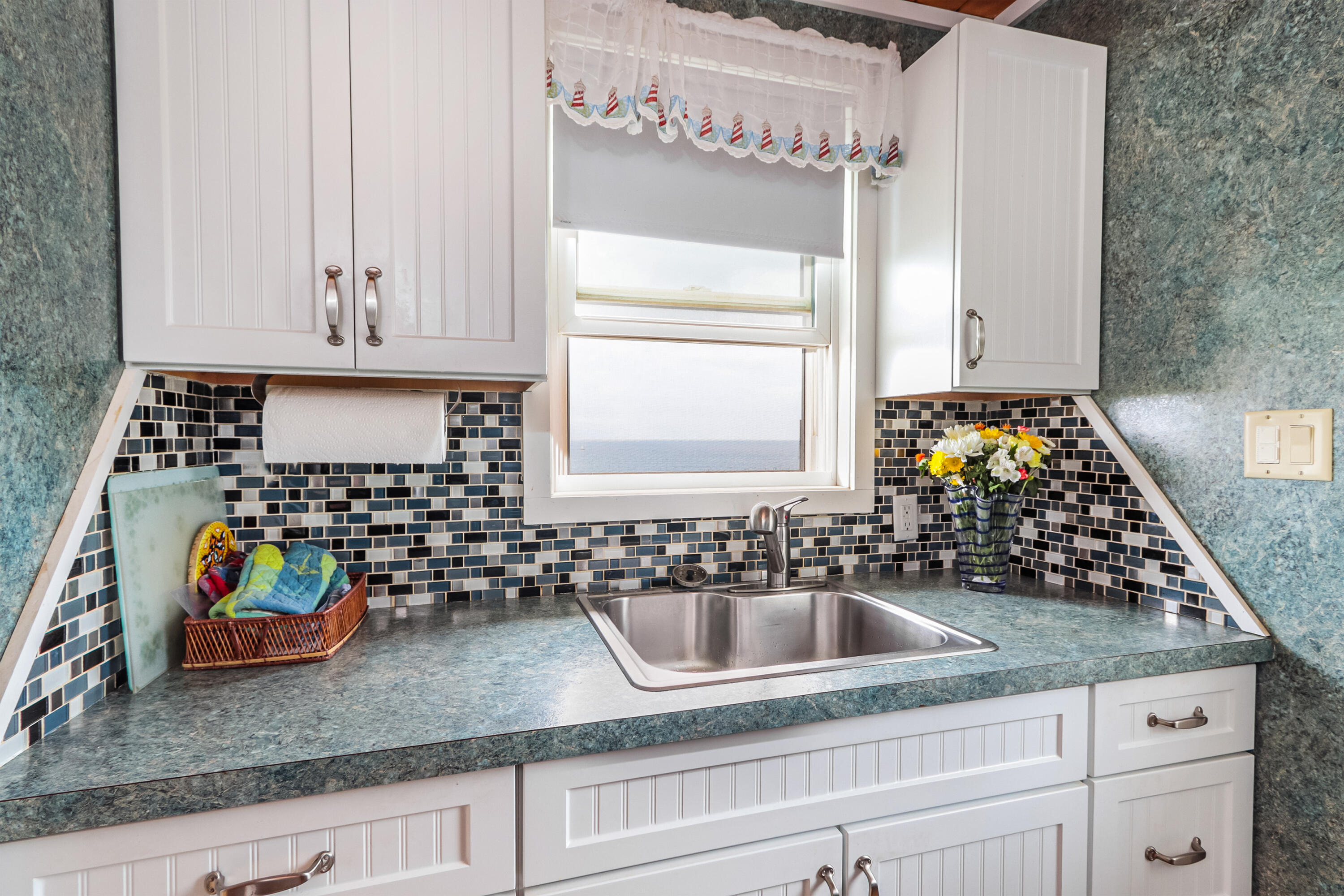 440 Nellie Road Wellfleet, MA 02667 - Photo 12 of 22 a kitchen with sink and window