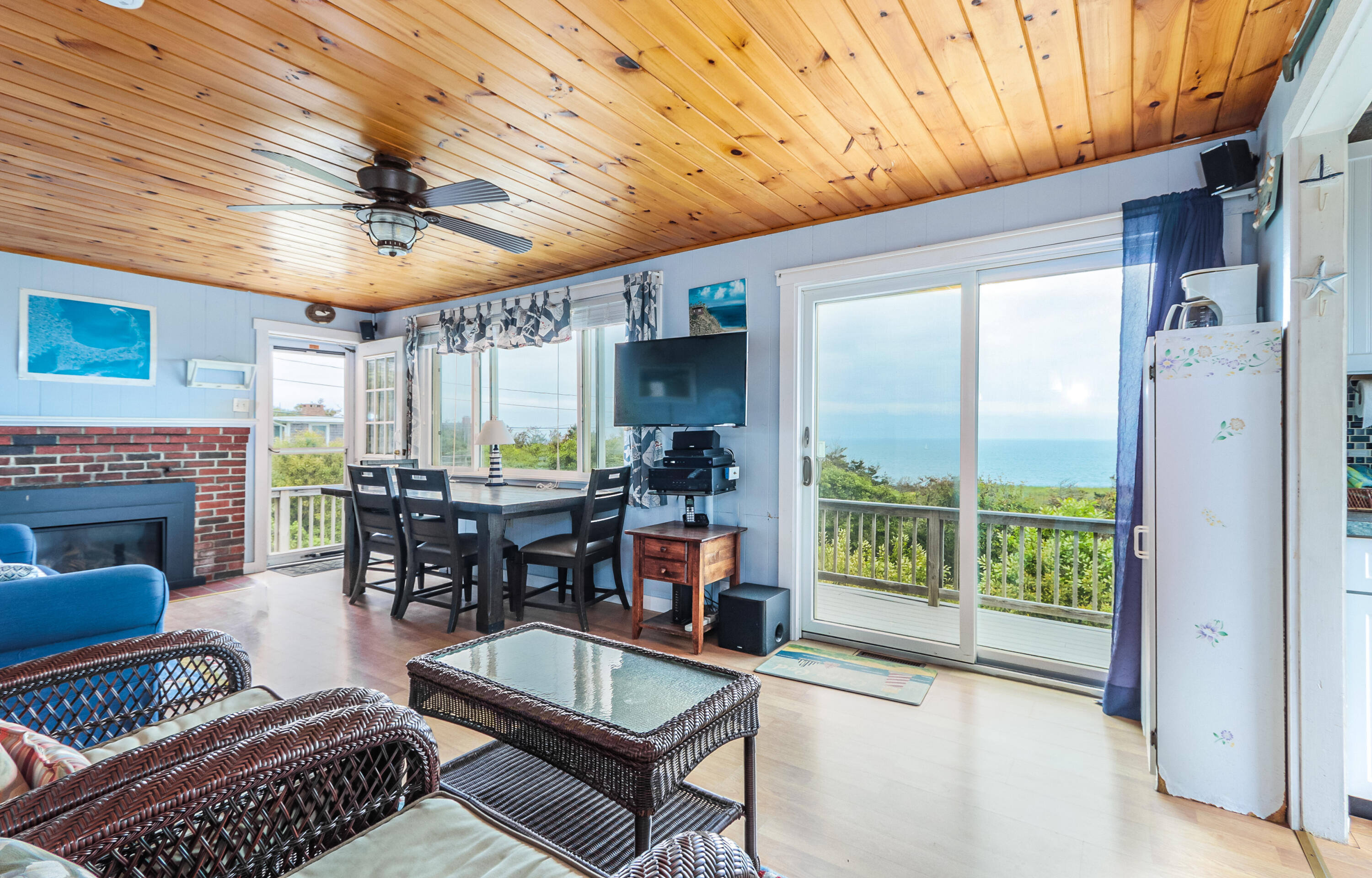 440 Nellie Road Wellfleet, MA 02667 - Photo 13 of 22 a living room with furniture and a fireplace