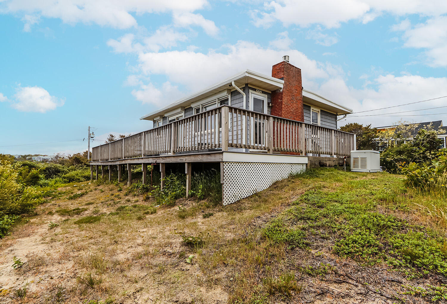 440 Nellie Road Wellfleet, MA 02667 - Photo 4 of 22 a view of a house with a yard