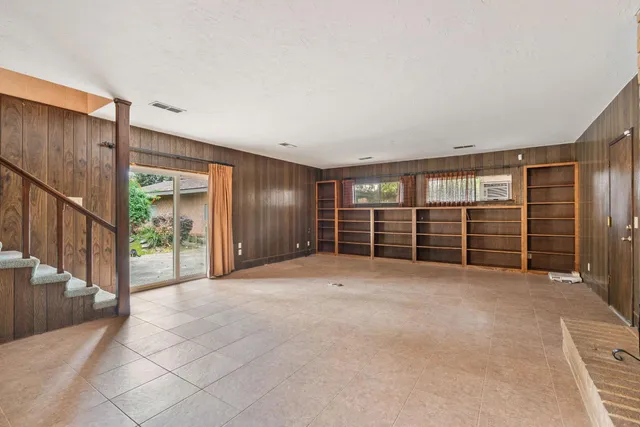 an empty room with a natural light