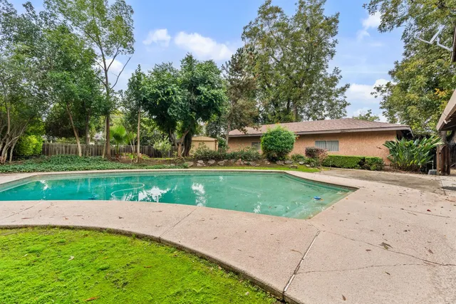 a view of room with a wooden floor